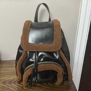 Skinny Dip Black Patent Sherpa Backpack